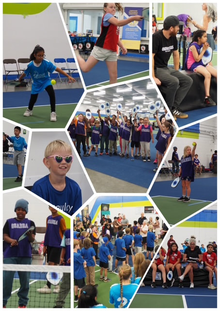 Joyful elementary students and dedicated AYPBC volunteers